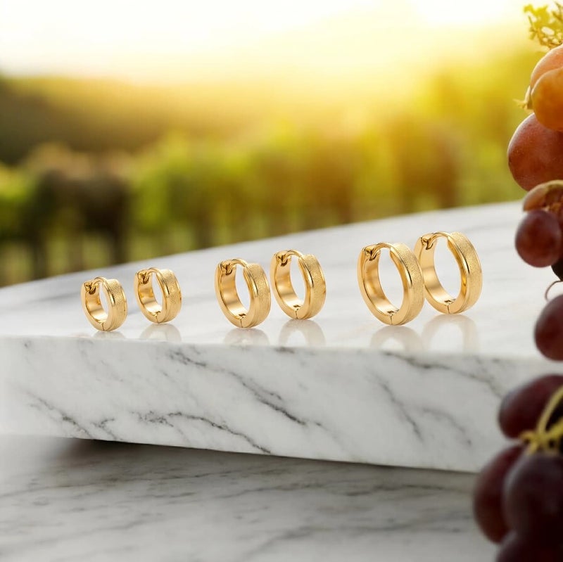 طقم حلقان أنيقة، مصنوعة من الستانلس ستيل المقاوم للصدأ. تجمع بين الملمس الناعم واللامع. 
3 أزواج بمقاسات متدرجة لتمنحك حرية التنسيق والتألق. - Image 5